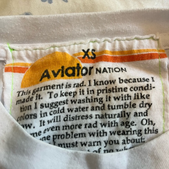white AV shirt with neon lightning bolt on side - Picture 2 of 3